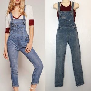 Free people light wash distressed overalls 24